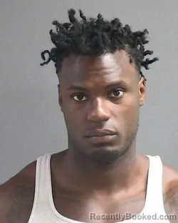 Mugshot of QUINSON DEROL ISME