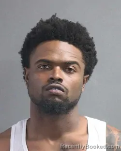 Mugshot of AMURI AMMANUEL KELSON