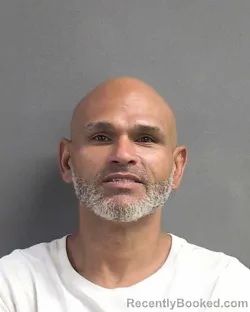 Mugshot of MIGUEL ANGEL QUINONES FLORES booked in Volusia County, Florida on May 7, 2026