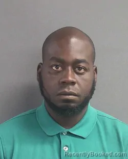Mugshot of Woodley Souverain booked in Volusia County, Florida on August 7, 2026
