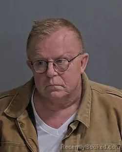 Mugshot of JOHN F PESNELL