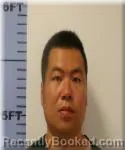 Mugshot of Yaolong Zhou booked in Seneca County, Ohio on June 17, 2026