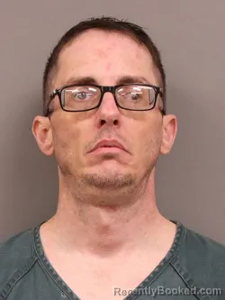 Mugshot of JOHN AARON UMBAUGH