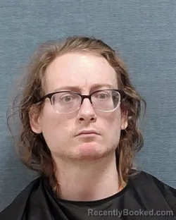 Mugshot of TYLER LEE RABER booked in Stark County, Ohio on March 21, 2026