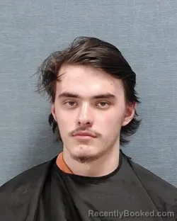 Mugshot of TYLER JAMES KUHN booked in Stark County, Ohio on May 13, 2026