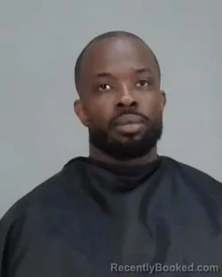 Mugshot of BRANDON M TRAVIS