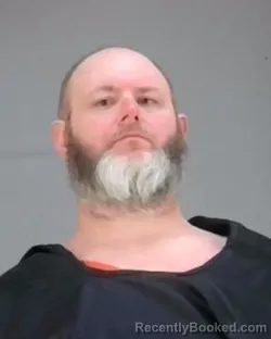 Mugshot of DANIEL J WEINSCHENK