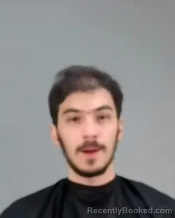 Mugshot of CHRISTOPHER VASSIL HAJDARI booked in Summit County, Ohio on April 2, 2026