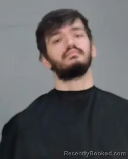 Mugshot of AUSTIN SPENCER ISKOW booked in Summit County, Ohio on March 23, 2026