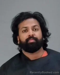 Mugshot of JOSHUA JAYANT ABRAHAM