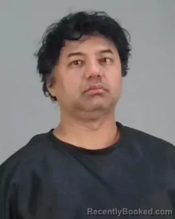 Mugshot of OM POKWAL