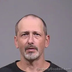 Mugshot of Brian Charles Devellin booked in Trumbull County, Ohio on August 7, 2026