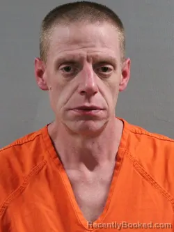 Mugshot of JOHN DAVID RAYMOND booked in Tuscarawas County, Ohio on March 22, 2026