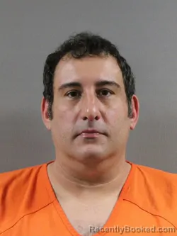 Mugshot of JOSHUA TYLER ALBERTINE booked in Tuscarawas County, Ohio on April 1, 2026