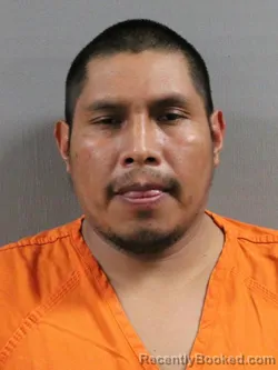 Mugshot of AGUSTIN SANTOS YAT booked in Tuscarawas County, Ohio on May 8, 2026