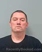 Mugshot of THOMAS M BROWN