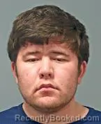 Mugshot of SADRIDDIN FAHRIDDIN HOLBEKOV