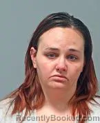 Mugshot of AMBER FAITH CARL booked in Warren County, Ohio on May 13, 2026