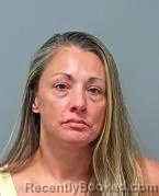 Mugshot of Andrea Dawn Slusser booked in Warren County, Ohio on October 16, 2026