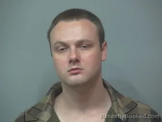 Mugshot of COLTEN DOMBROSKI