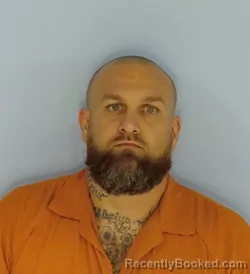 Mugshot of JUSTIN ALAN CATRETT booked in Walton County, Florida on May 6, 2026