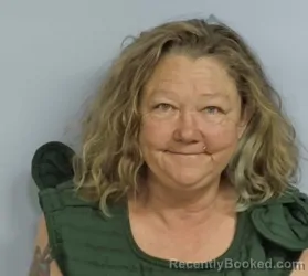 Mugshot of KELLY MICHELLE DAVIS booked in Walton County, Florida on April 1, 2026