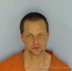 Mugshot of DANIEL ELLIHUE ELY booked in Walton County, Florida on March 13, 2026