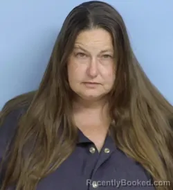 Mugshot of CARRIE LYNN LONGMIRE booked in Walton County, Florida on April 7, 2026