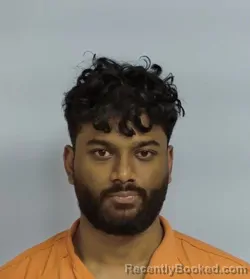 Mugshot of AKHIL MUTLURU booked in Walton County, Florida on March 18, 2026