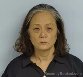Mugshot of Yanping Jin Milkins booked in Walton County, Florida on September 22, 2026