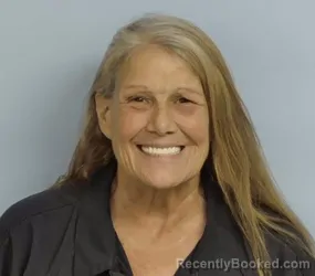 Mugshot of TINA MARKHAM PROCTOR booked in Walton County, Florida on May 13, 2026