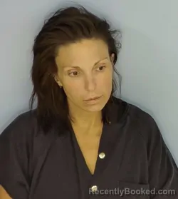 Mugshot of KATHRYN FEWELL REID booked in Walton County, Florida on May 12, 2026