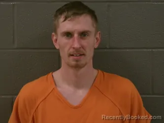 Mugshot of AUSTIN TRAVIS SMITH