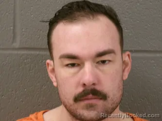 Mugshot of DEVON JEFFEREY NATHAL KARRAKER booked in Wood County, Ohio on March 19, 2026