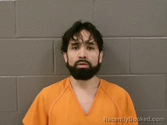 Mugshot of JUAN ANTONIO JR MARTINEZ