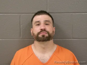 Mugshot of JOHN PATRICK REZA booked in Wood County, Ohio on June 9, 2026
