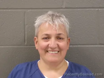 Mugshot of Rebecca Sue Flores booked in Wood County, Ohio on September 14, 2026