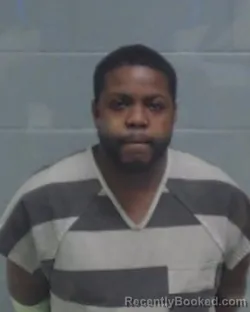 Mugshot of MILTON GENIUS HIGGINS