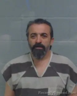 Mugshot of MOHARAM ALI NOGHLI