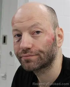 Mugshot of BRYAN GUY-ADAMS TATE