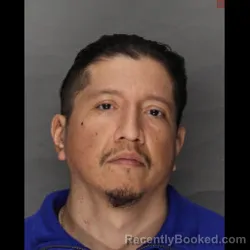 Mugshot of QUIRINO MADRIGAL