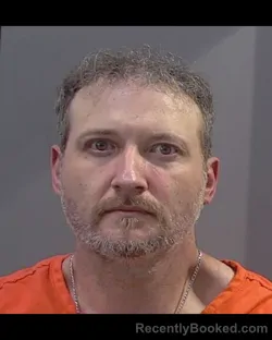 Mugshot of JUSTIN RANDOLPH BURNS