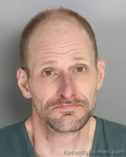 Mugshot of JUSTIN BURTON