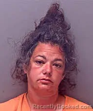 Mugshot of DISA MARIE HARGLE booked in Baldwin County, Alabama on April 1, 2026