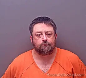 Mugshot of ERIK JOSEPH MOUCHETT