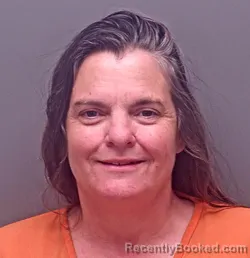 Mugshot of CARRIE ANN KOPTIS booked in Baldwin County, Alabama on March 28, 2026