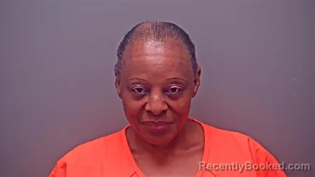 Mugshot of MABEL WEAVER booked in Baldwin County, Alabama on March 14, 2026