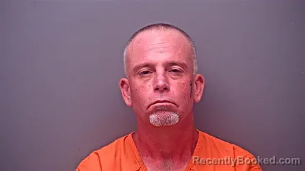 Mugshot of Johnny Ray Austin Cooper booked in Baldwin County, Alabama on August 24, 2026