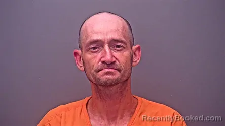 Mugshot of CHRISTOPHER WAYNE BURKETT booked in Baldwin County, Alabama on May 14, 2026