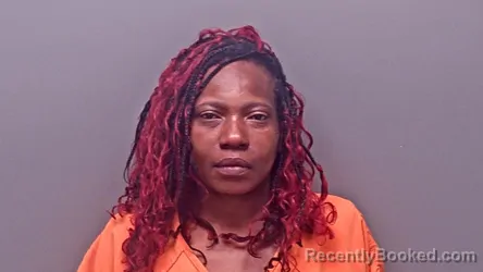 Mugshot of Taneik Latrice Woodson booked in Baldwin County, Alabama on August 18, 2026